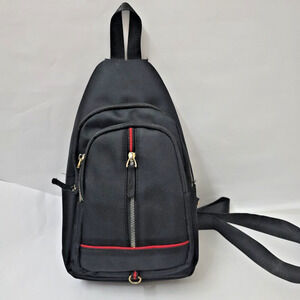 NOLLIA mini Black backpack crossbody bag. Adjustable strap. Red zipper trim.